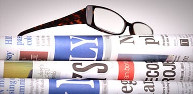 General news Newspapers with eyeglasses on top