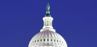 Dome of the US Capitol with statue of Freedom