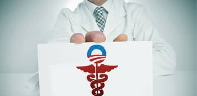 Doctor and Obamacare doctor holding up Obamacare sign