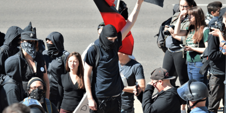 Masked Antifa left-wing militant group protesting